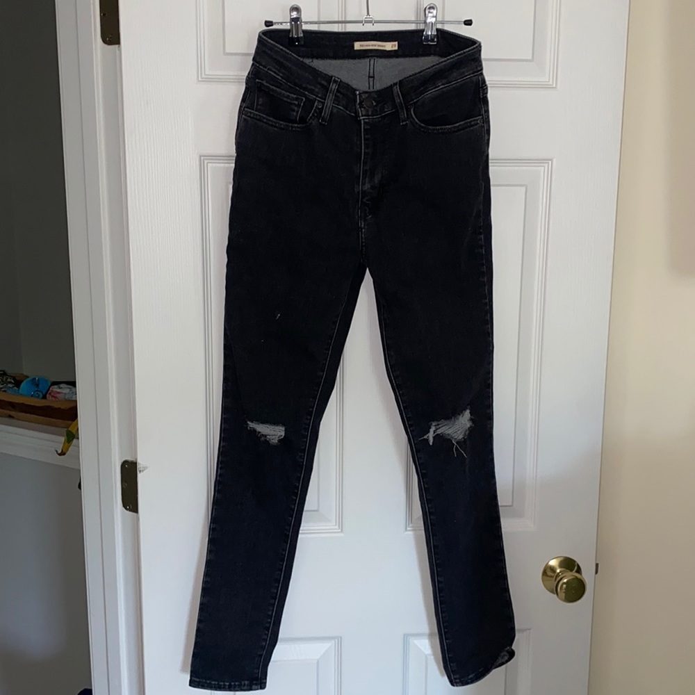 Levi’s black skinny jeans never worn